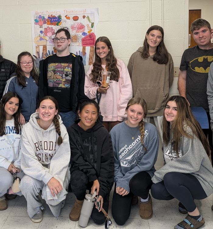 a group of high school students smiling