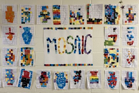 A display of mosaic artwork on the wall