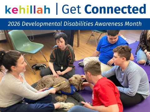A group of teens with a therapy dog and its handler